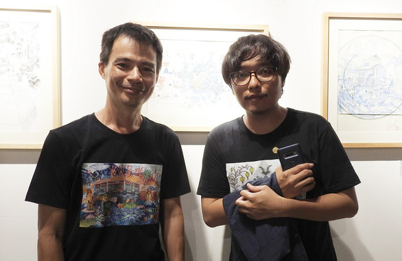 Họa sĩ Bùi Công Khánh (trái) và họa sĩ Lin Shu Kai - Ảnh: H.DUY